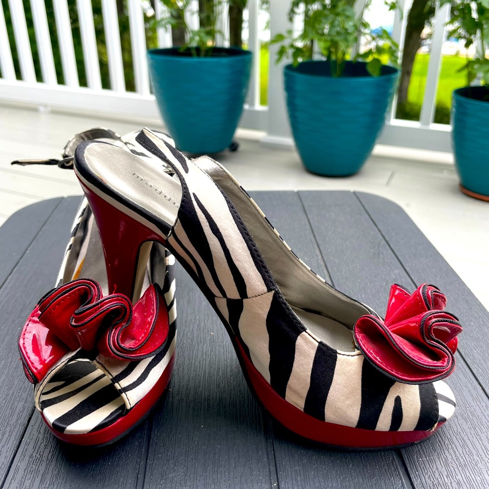 Zebra print sling back peep toe pumps!